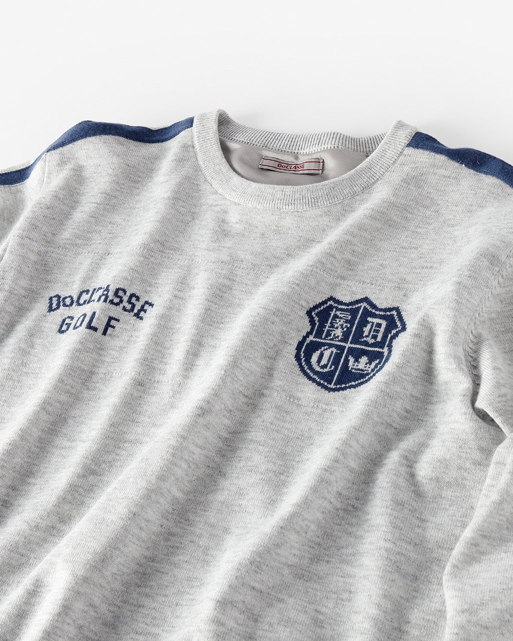 ロゴ防風裏地ニットクルーネック/DoCLASSE